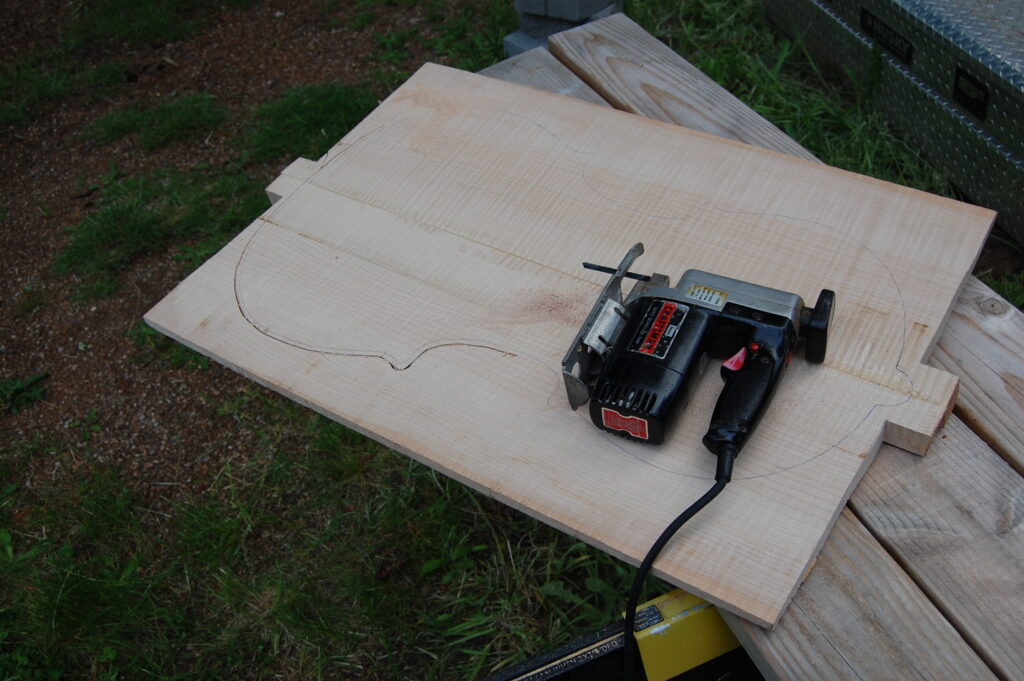 Using Handheld sabersaw to cut out preliminary plate outline.