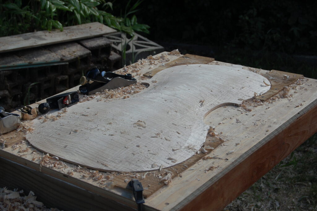 Cello back plate arching partially completed