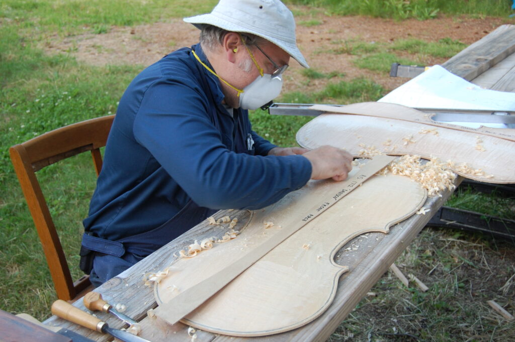 Using the back arching template to refine the back plate